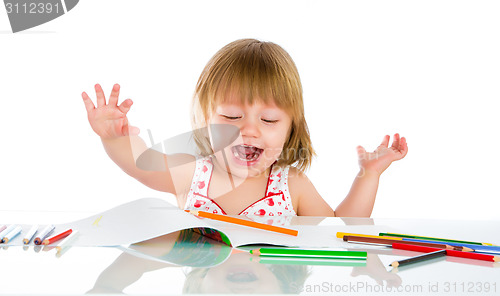 Image of Little baby girl draws pencil