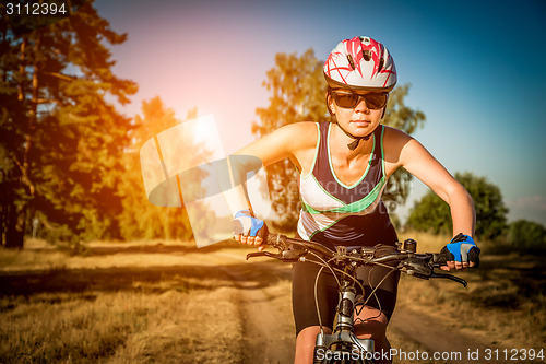 Image of Women on bike