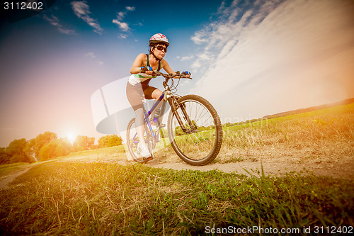 Image of Women on bike
