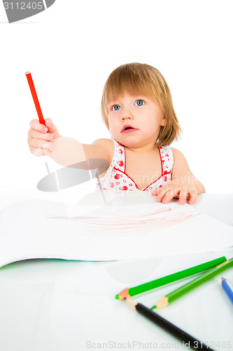 Image of Little baby girl draws pencil