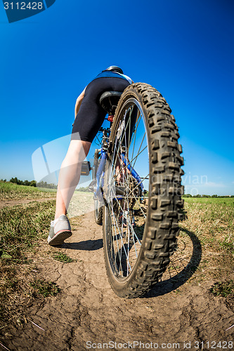 Image of Women on bike