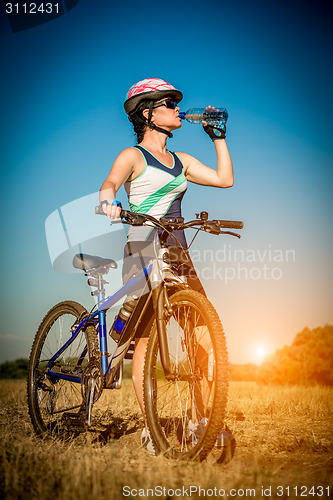 Image of Women on bike