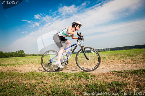 Image of Women on bike