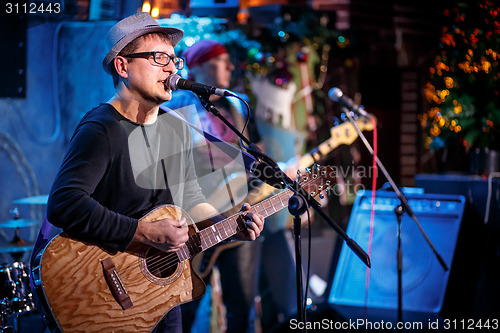 Image of Band performs on stage