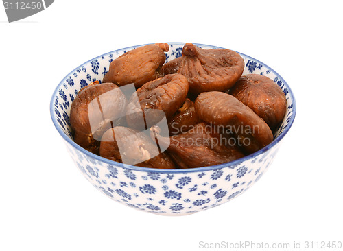 Image of Whole dried figs in a blue and white china bowl