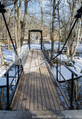 Image of Bridge across the canal in the spring