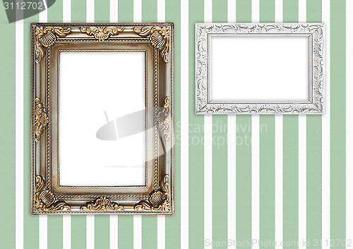 Image of Picture frames on striped wall