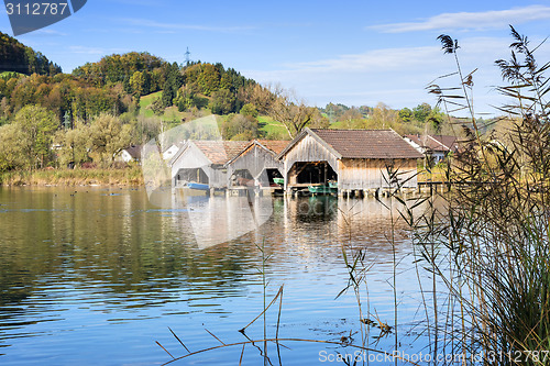 Image of boathouses and reed at lake Kochelsee