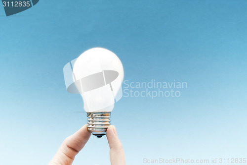 Image of Background with lit lightbulb