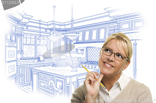 Image of Woman With Pencil Over Custom Kitchen Design Drawing