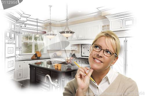 Image of Woman With Pencil Over Custom Kitchen Design Drawing and Photo