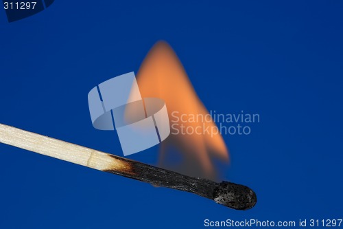 Image of Single burning match