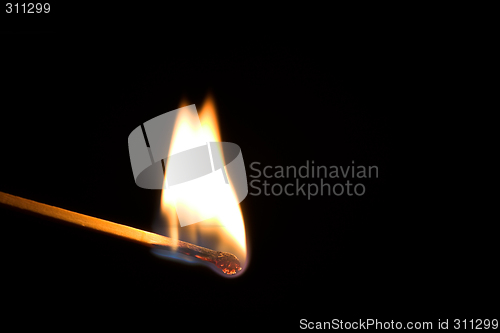Image of Single burning match