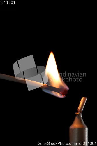 Image of Lighting a candle.