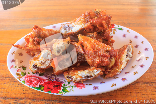 Image of Fresh fried chicken on a plate set