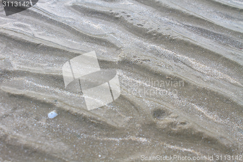 Image of Beach sand waves warm texture 