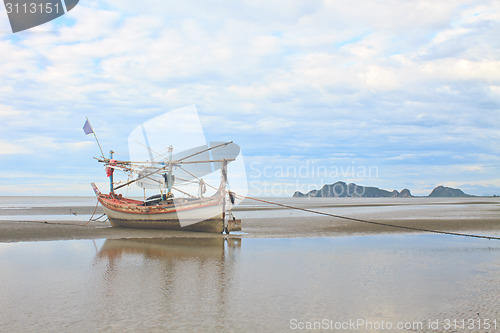 Image of Fishing boat on the beach