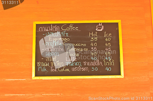 Image of coffee and beverage menu on wall