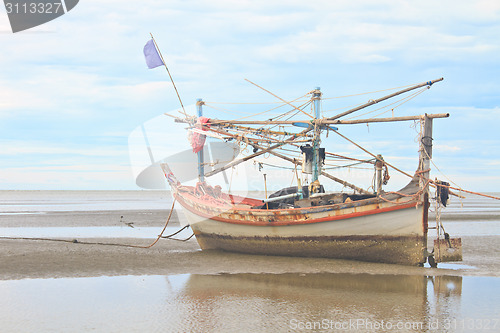 Image of Fishing boat on the beach