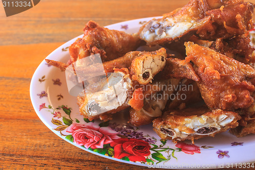 Image of Fresh fried chicken on a plate set