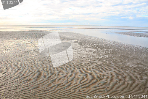 Image of Beach sand waves warm texture 