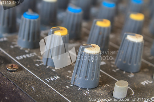 Image of old buttons equipment audio