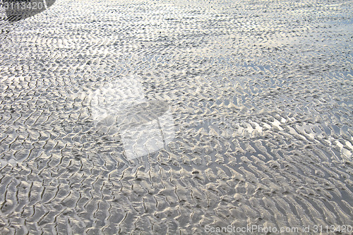 Image of Beach sand waves warm texture 
