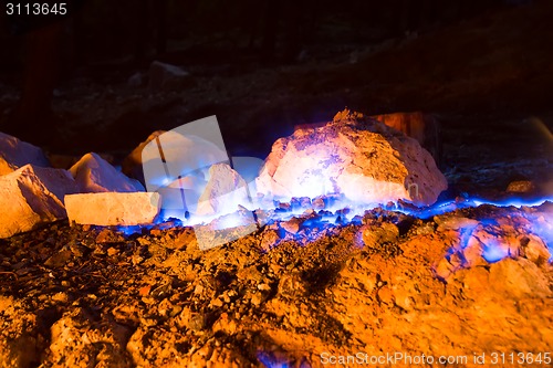 Image of natural gas burns a flame at night