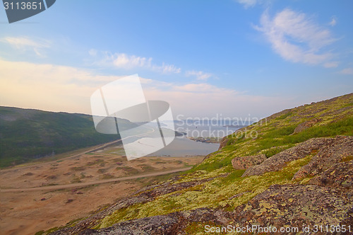 Image of polar sea and shore road