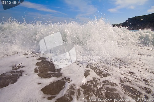 Image of beach waves sea surf foamy nearby