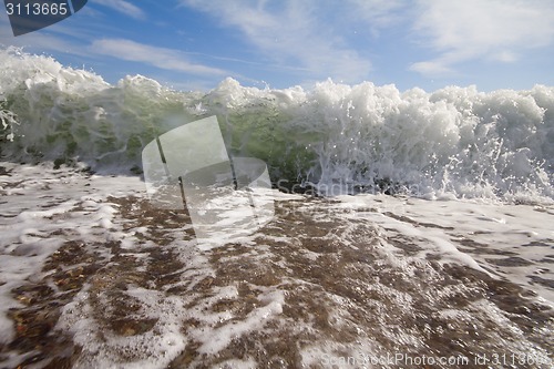 Image of sea surf foamy beach wave nearby