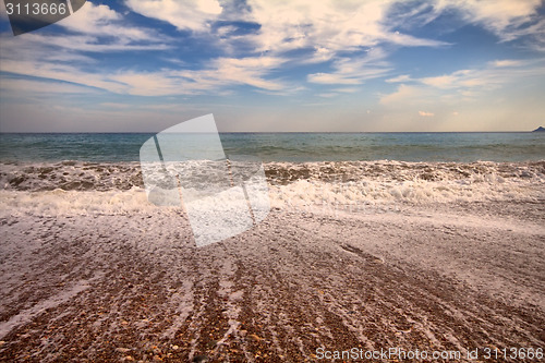 Image of sea surf foamy beach wave nearby