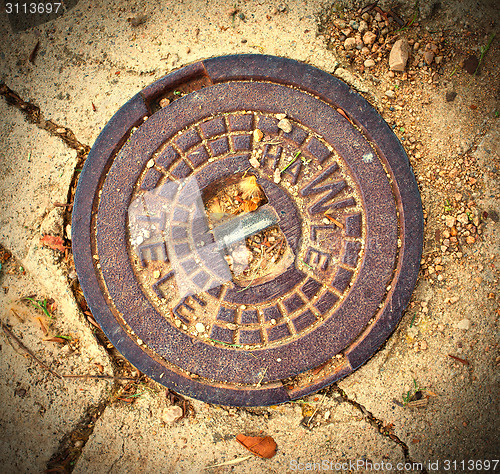 Image of manhole cover in Tossa de Mar, Catalonia, Spain