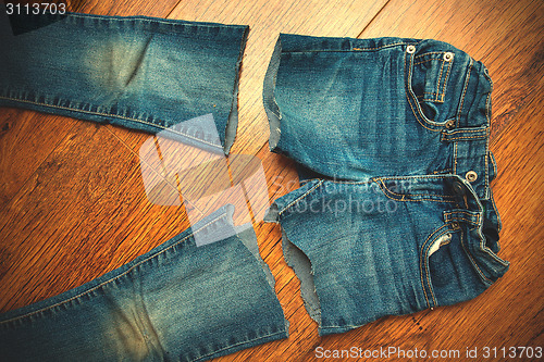 Image of cut old jeans