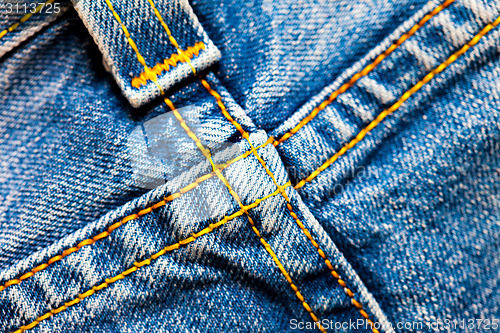 Image of Crossed seams on denim