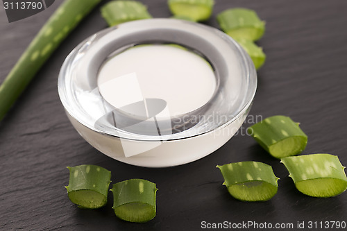 Image of aloe vera - leaves and cream