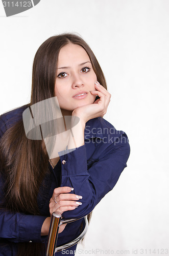 Image of Dynamic portrait of girl on a chair