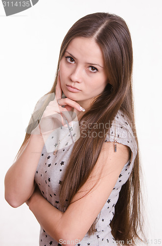 Image of Portrait of pretty girl with finger at the person