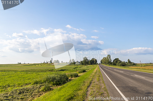 Image of Road through fields downcountry in summer 