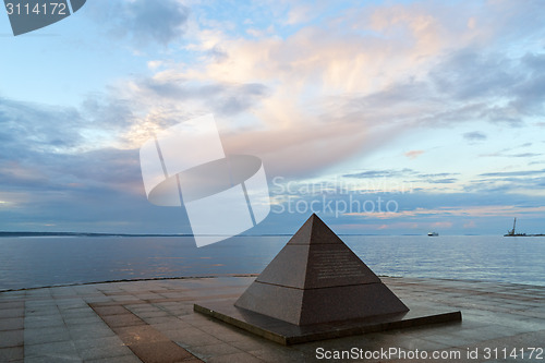 Image of Pyramid on city lake quay in summer 