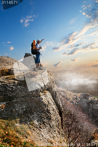 Image of Tourist on rock