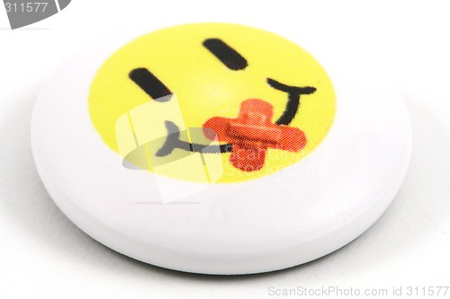 Image of smiley badge