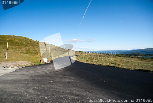 Image of Road through mountain plateau Valdresflye, Jotunheimen, Norway