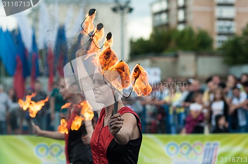 Image of The girls performed a dance with burning torches