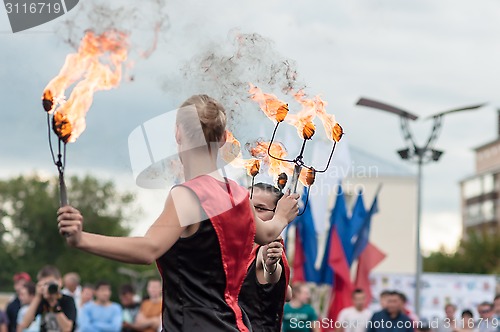 Image of The girls performed a dance with burning torches