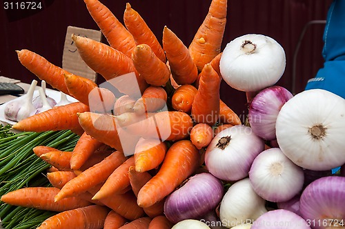 Image of Fresh vegetables and herbs are sold at the Bazaar