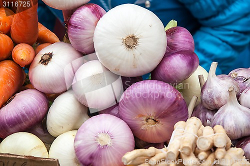 Image of Fresh vegetables and herbs are sold at the Bazaar