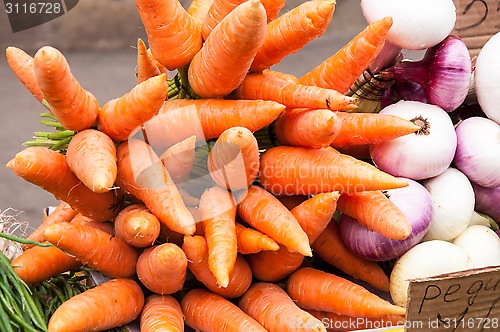 Image of Fresh vegetables and herbs are sold at the Bazaar