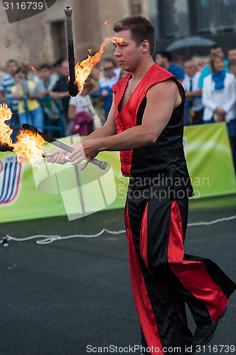 Image of Juggling flaming batons