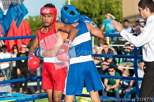 Image of A boxing match Javier Ibanez, Cuba and Malik Bajtleuov, Russia. Defeated Javier Ibanez